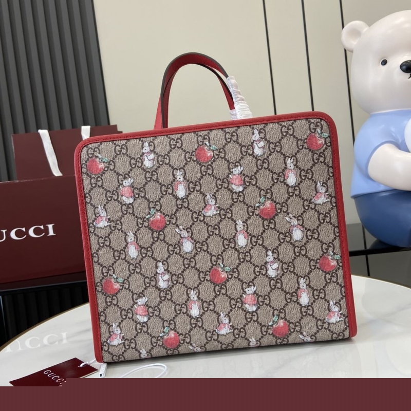 G*u*i shopping bags